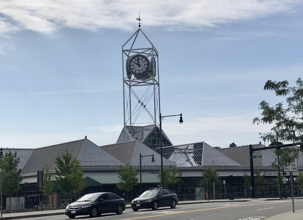 99 Brookley Road, Unit 1 Boston, MA 02130 - Photo 39 of 40 a front view of a building with garage