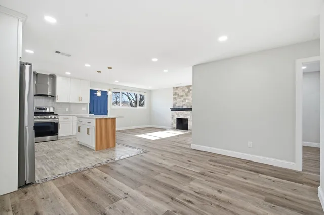 a view of kitchen with wooden floor