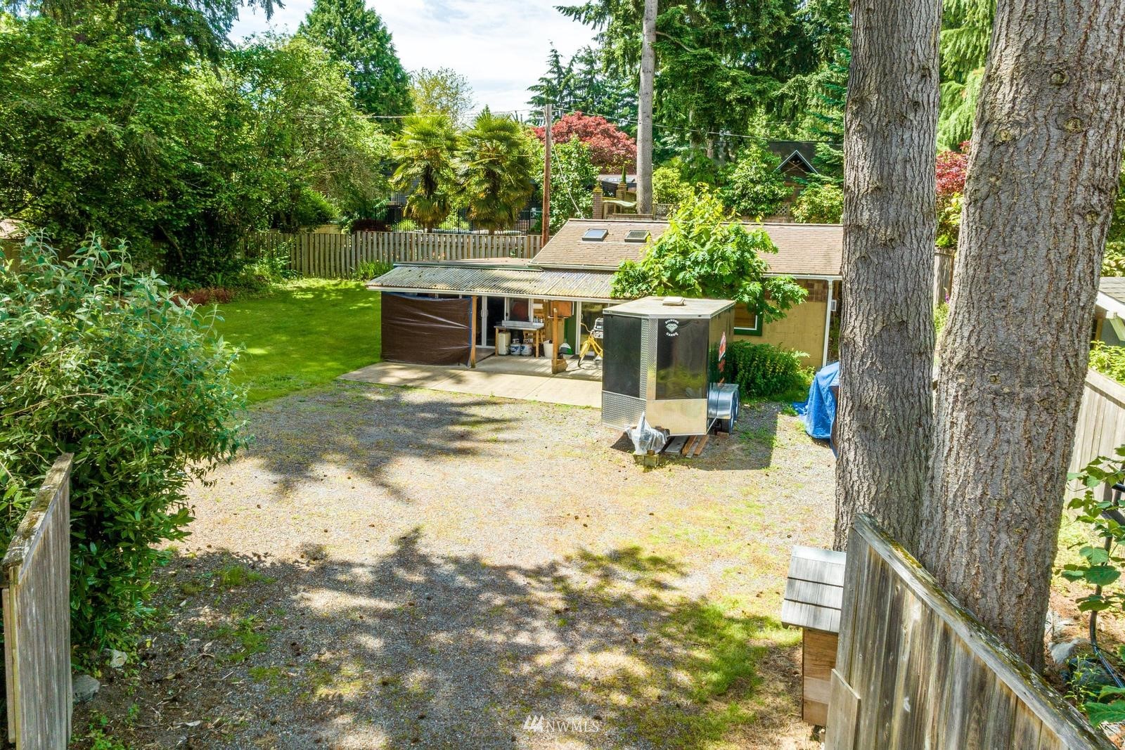 9325 Northeast 175th Street Bothell, WA 98011 - Photo 2 of 19 a view of a house with backyard and sitting area