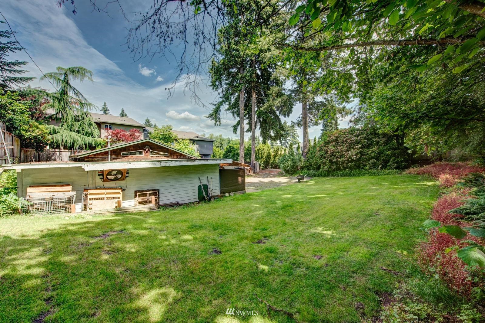 9325 Northeast 175th Street Bothell, WA 98011 - Photo 4 of 19 a view of a garden with an outdoor space