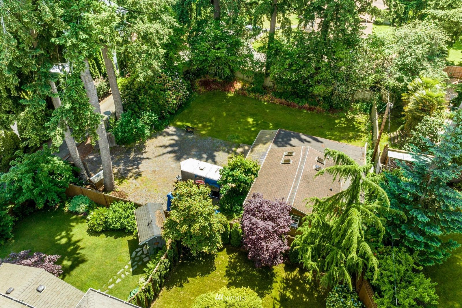9325 Northeast 175th Street Bothell, WA 98011 - Photo 8 of 19 an aerial view of residential house with outdoor space and trees all around