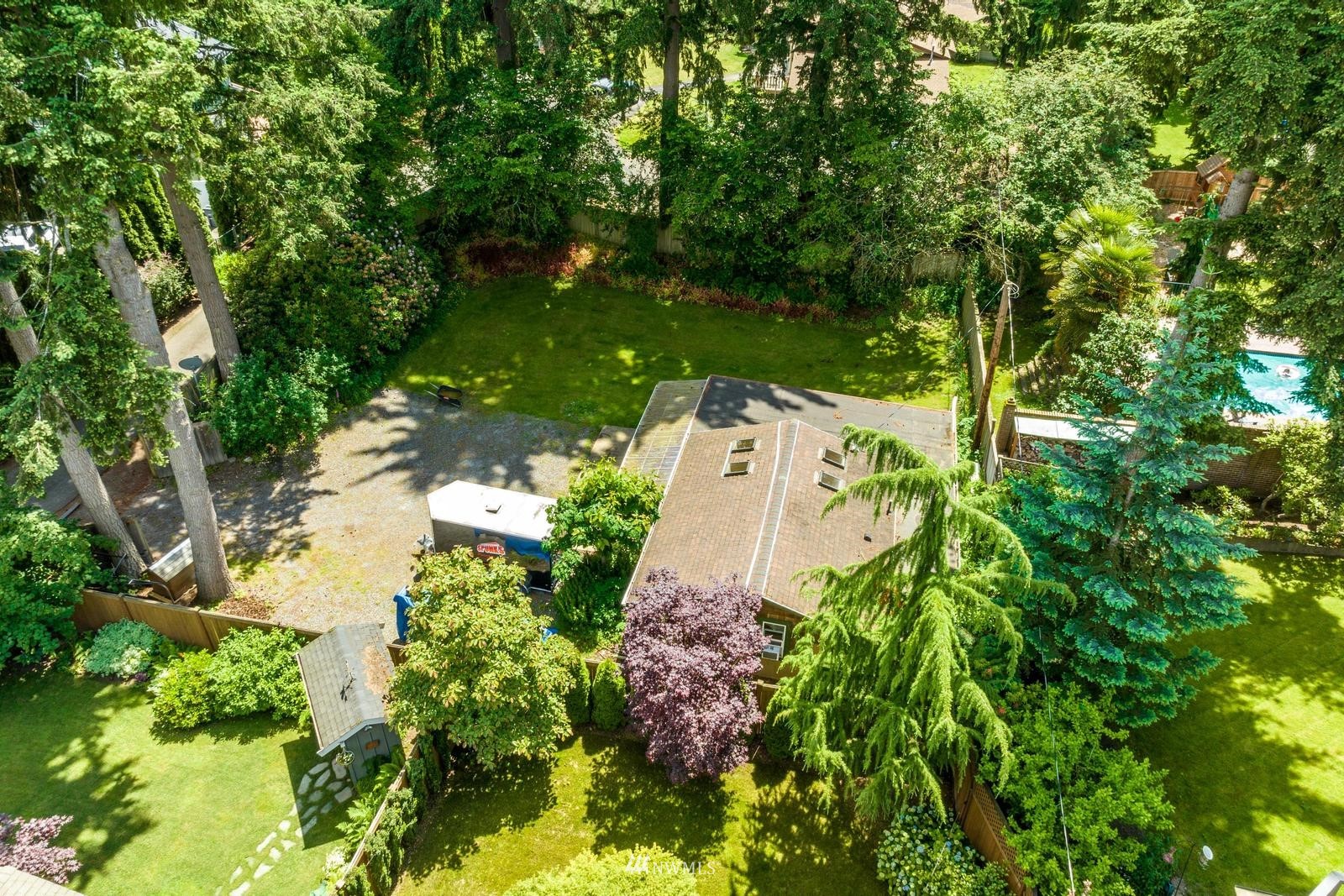 9325 Northeast 175th Street Bothell, WA 98011 - Photo 9 of 19 an aerial view of a house with a yard