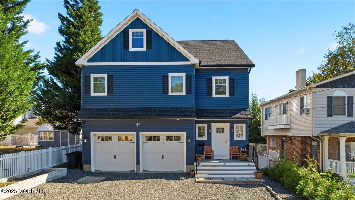 26 Ralph Street Highlands, NJ 07732 - Photo 1 of 51 a front view of a house with a garage