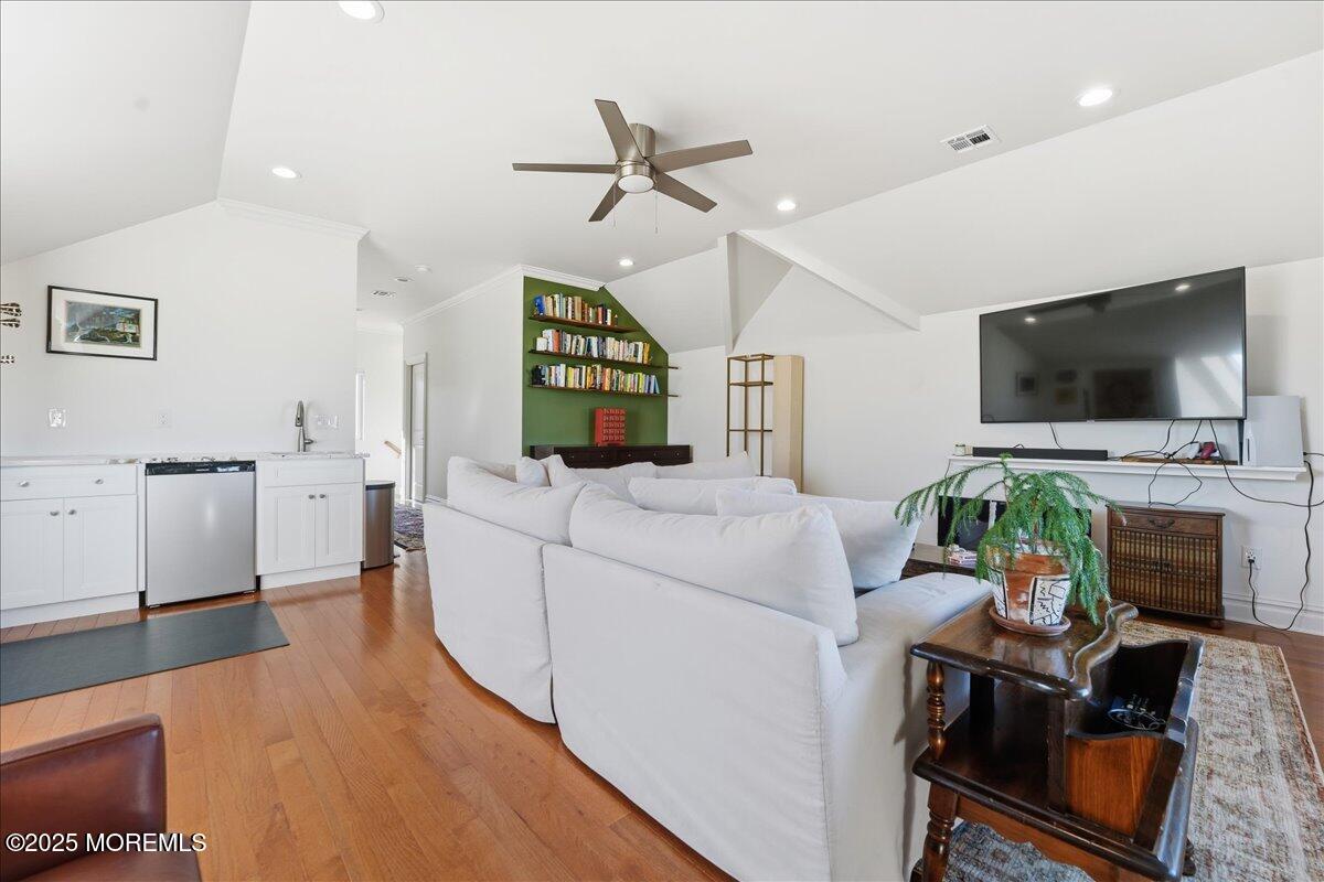 26 Ralph Street Highlands, NJ 07732 - Photo 12 of 51 a living room with furniture and a flat screen tv