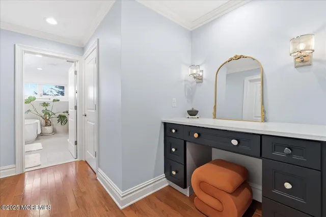 a view of living room with wooden floor