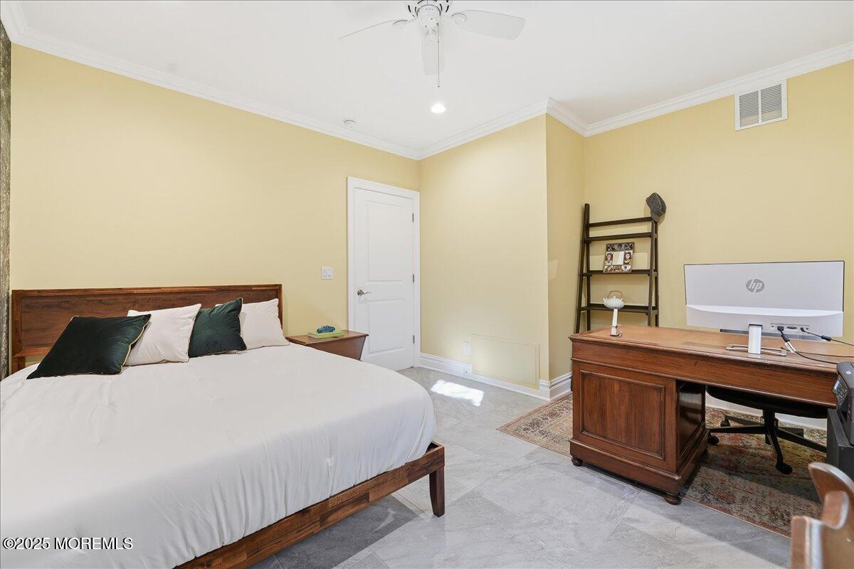 26 Ralph Street Highlands, NJ 07732 - Photo 20 of 51 a bedroom with a bed and a table in it