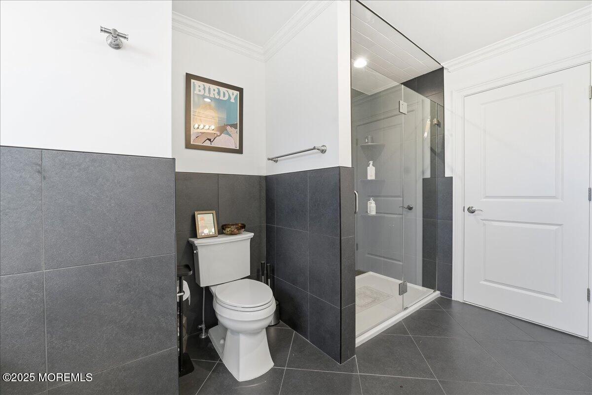 26 Ralph Street Highlands, NJ 07732 - Photo 22 of 51 a bathroom with a toilet and a shower