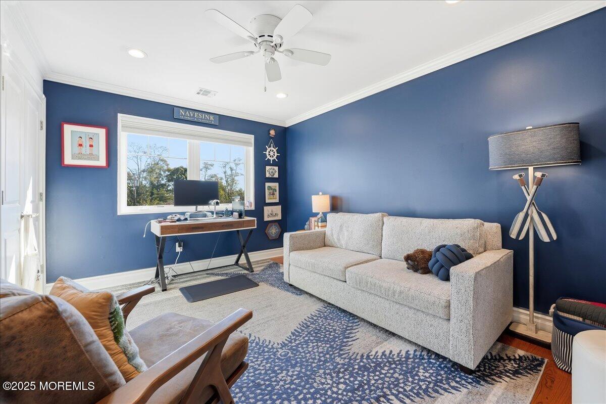 26 Ralph Street Highlands, NJ 07732 - Photo 24 of 51 a living room with furniture and a large window