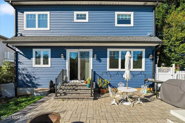 a front view of a house with a patio