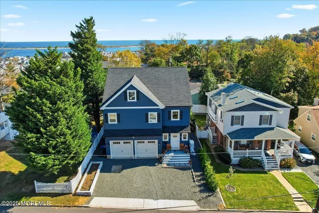 an aerial view of a house with swimming pool