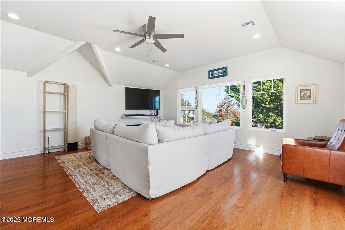 26 Ralph Street Highlands, NJ 07732 - Photo 10 of 51 a living room with furniture and a flat screen tv
