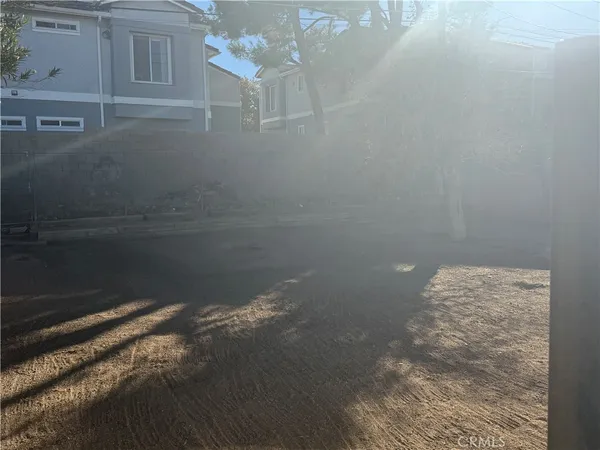 a kitchen with cabinets stove and a sink
