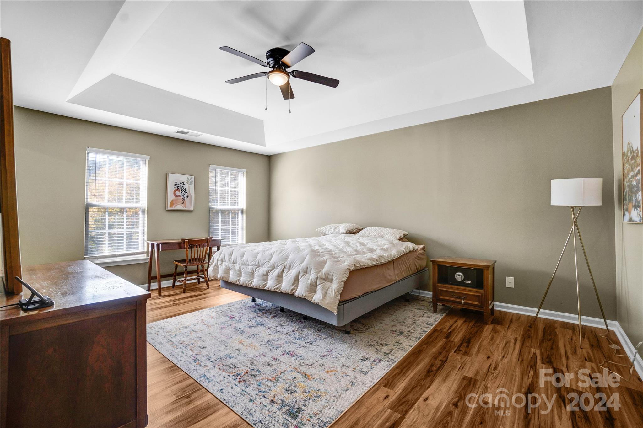 12502 Chickasaw Drive Huntersville, NC 28078 - Photo 17 of 39 a bedroom with a bed a couch and dresser