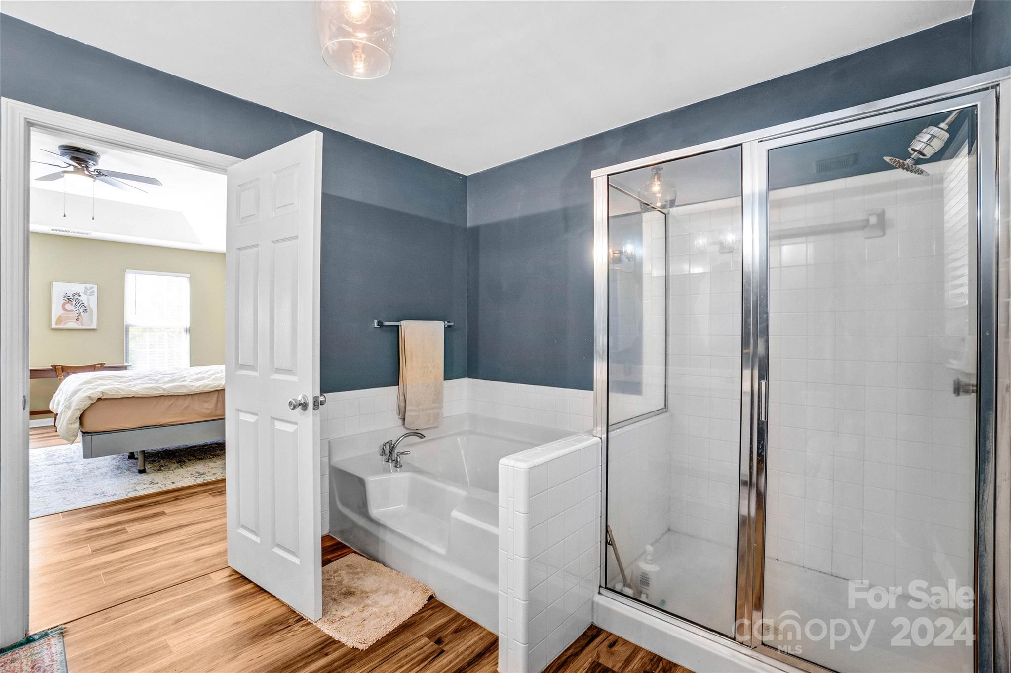 12502 Chickasaw Drive Huntersville, NC 28078 - Photo 20 of 39 a en suite bathroom with a shower