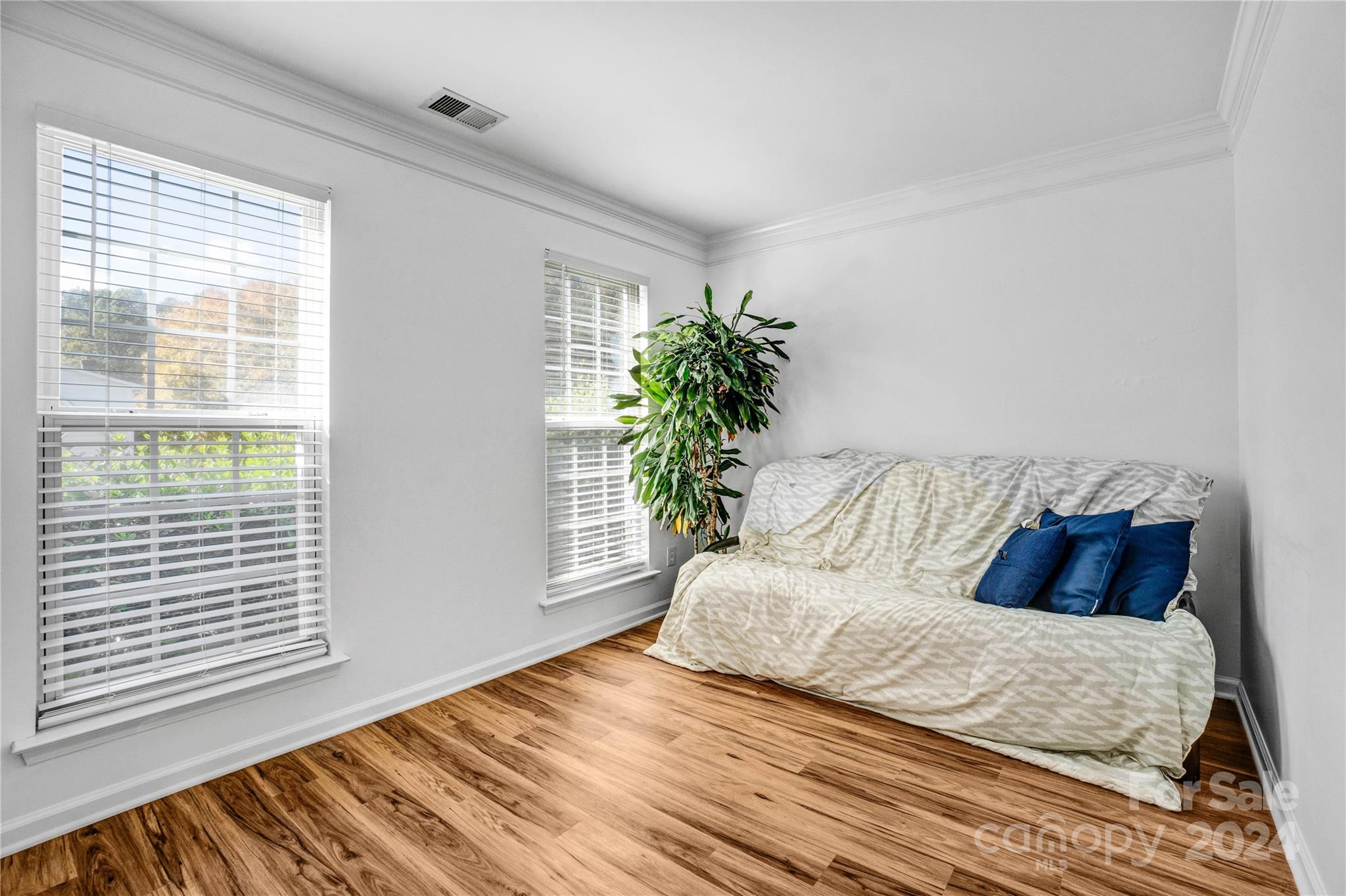 12502 Chickasaw Drive Huntersville, NC 28078 - Photo 7 of 39 a bedroom with a large bed and a window