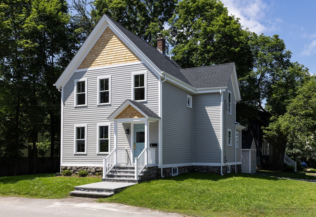 8 Florence Street Natick, MA 01760 - Photo 1 of 38 a front view of a house with a yard