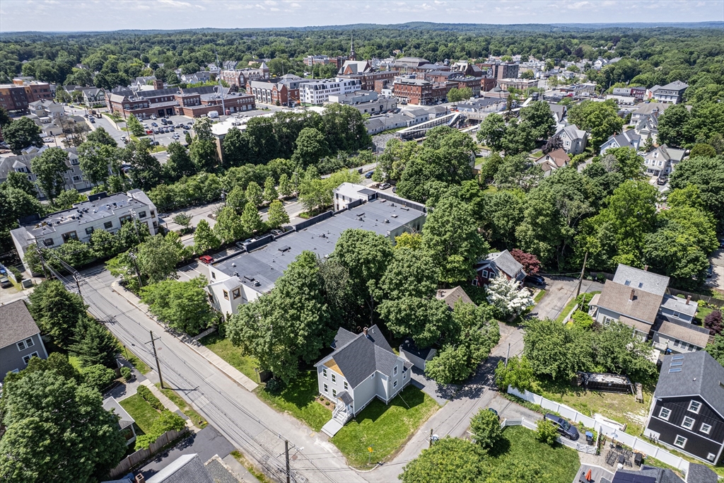 8 Florence Street Natick, MA 01760 - Photo 12 of 38 an aerial view of residential houses with outdoor space and street view