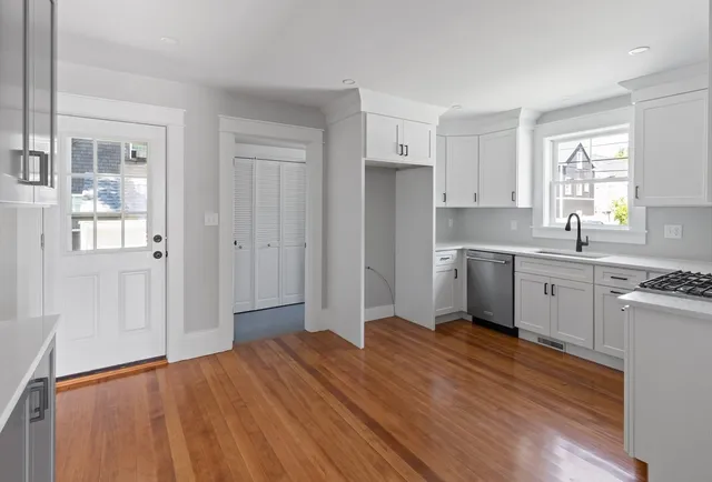 a bathroom with a sink toilet and tub