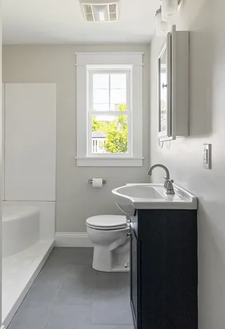 a view of balcony with wooden floor