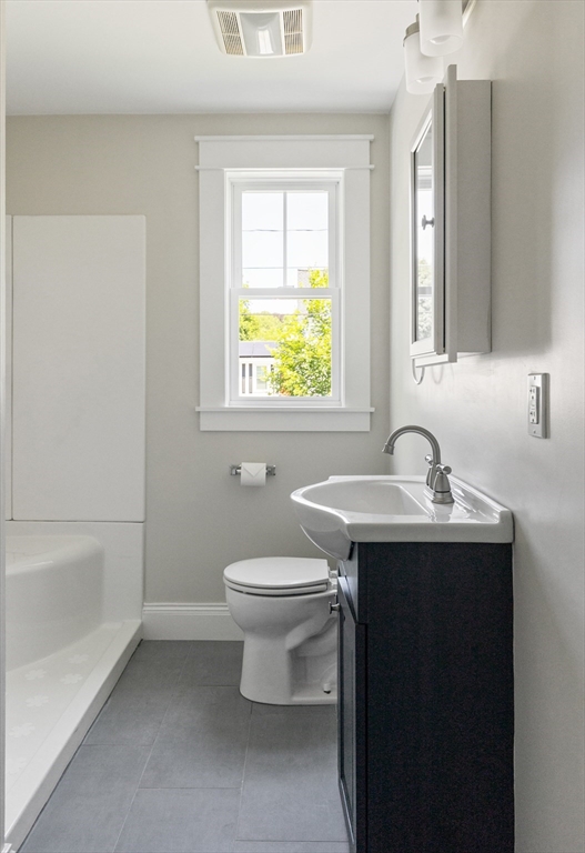 8 Florence Street Natick, MA 01760 - Photo 27 of 38 a bathroom with a sink toilet and a bathtub