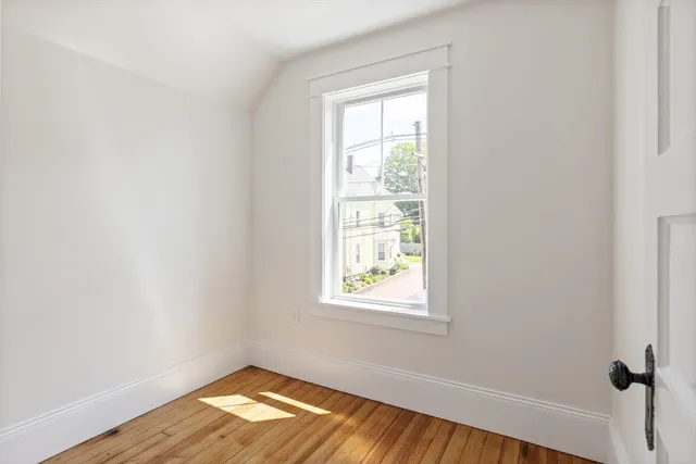 a bathroom with a granite countertop sink a toilet and bathtub