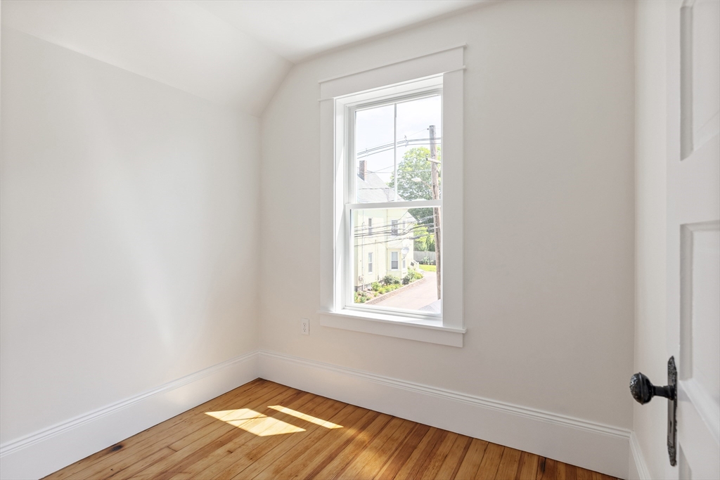 8 Florence Street Natick, MA 01760 - Photo 34 of 38 an empty room with a window
