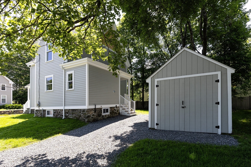 8 Florence Street Natick, MA 01760 - Photo 7 of 38 a view of a house with a yard