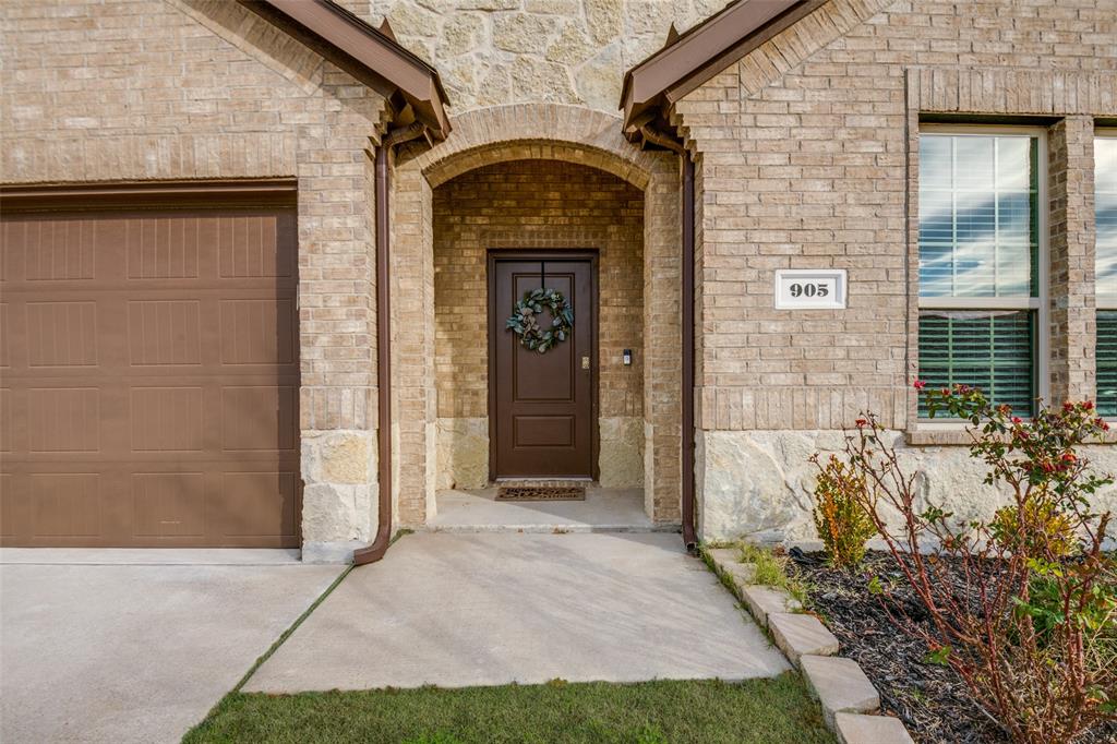 905 Philadelphia Street Fate, TX 75189 - Photo 3 of 25 a view of front door of house