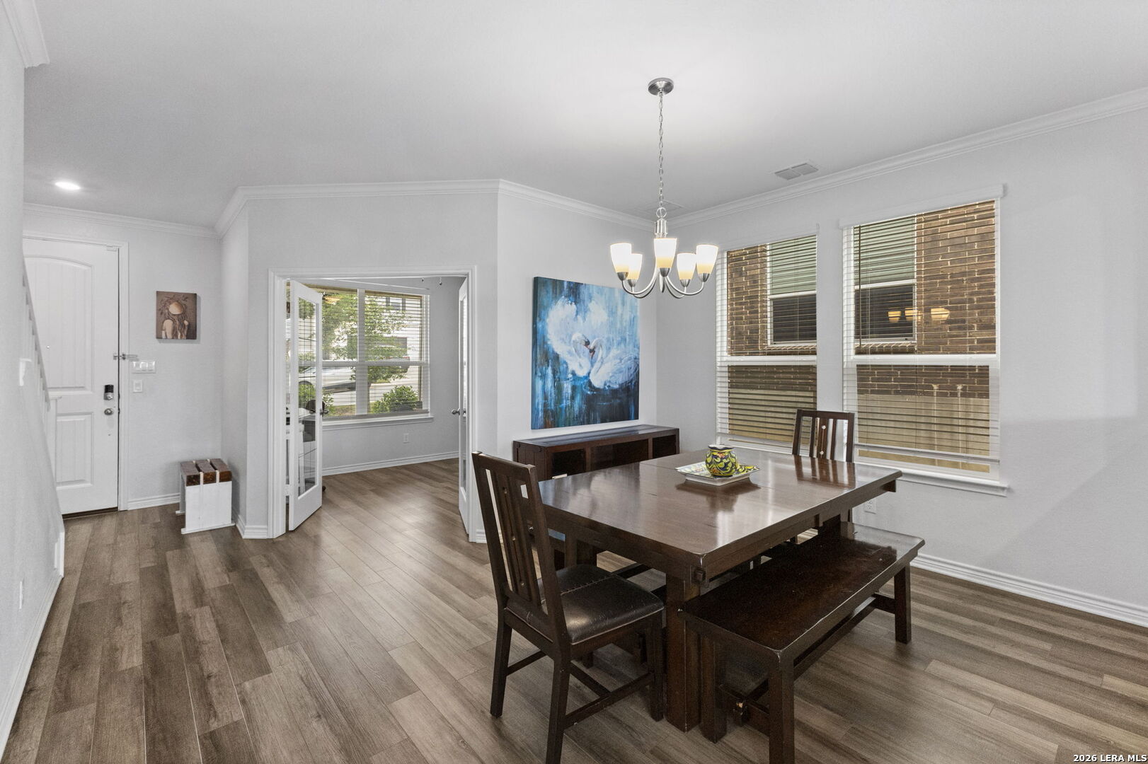 29985 Sebastian Bulverde, TX 78163 - Photo 11 of 37 a view of a dining room with furniture window and wooden floor