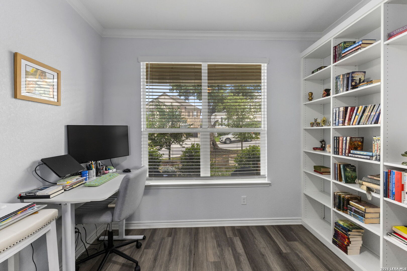 29985 Sebastian Bulverde, TX 78163 - Photo 19 of 37 a view of a workspace with furniture and a bookshelf
