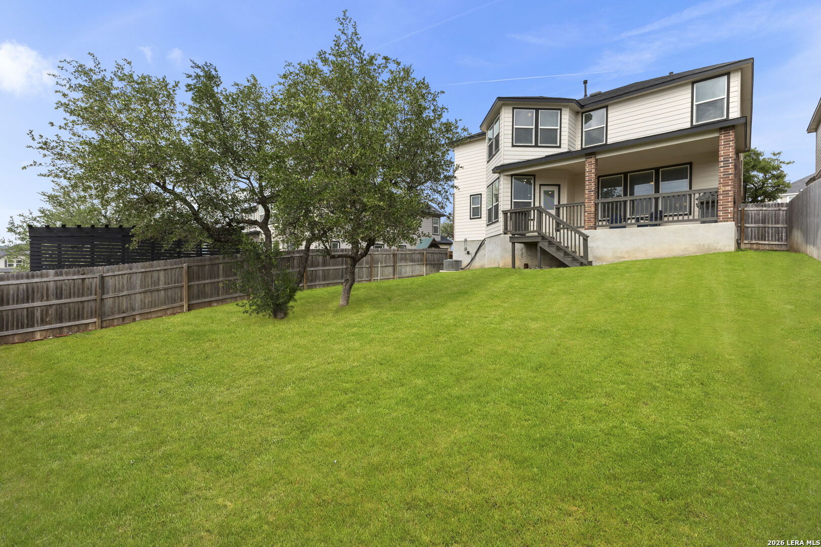 29985 Sebastian Bulverde, TX 78163 - Photo 34 of 37 a view of a house with a backyard