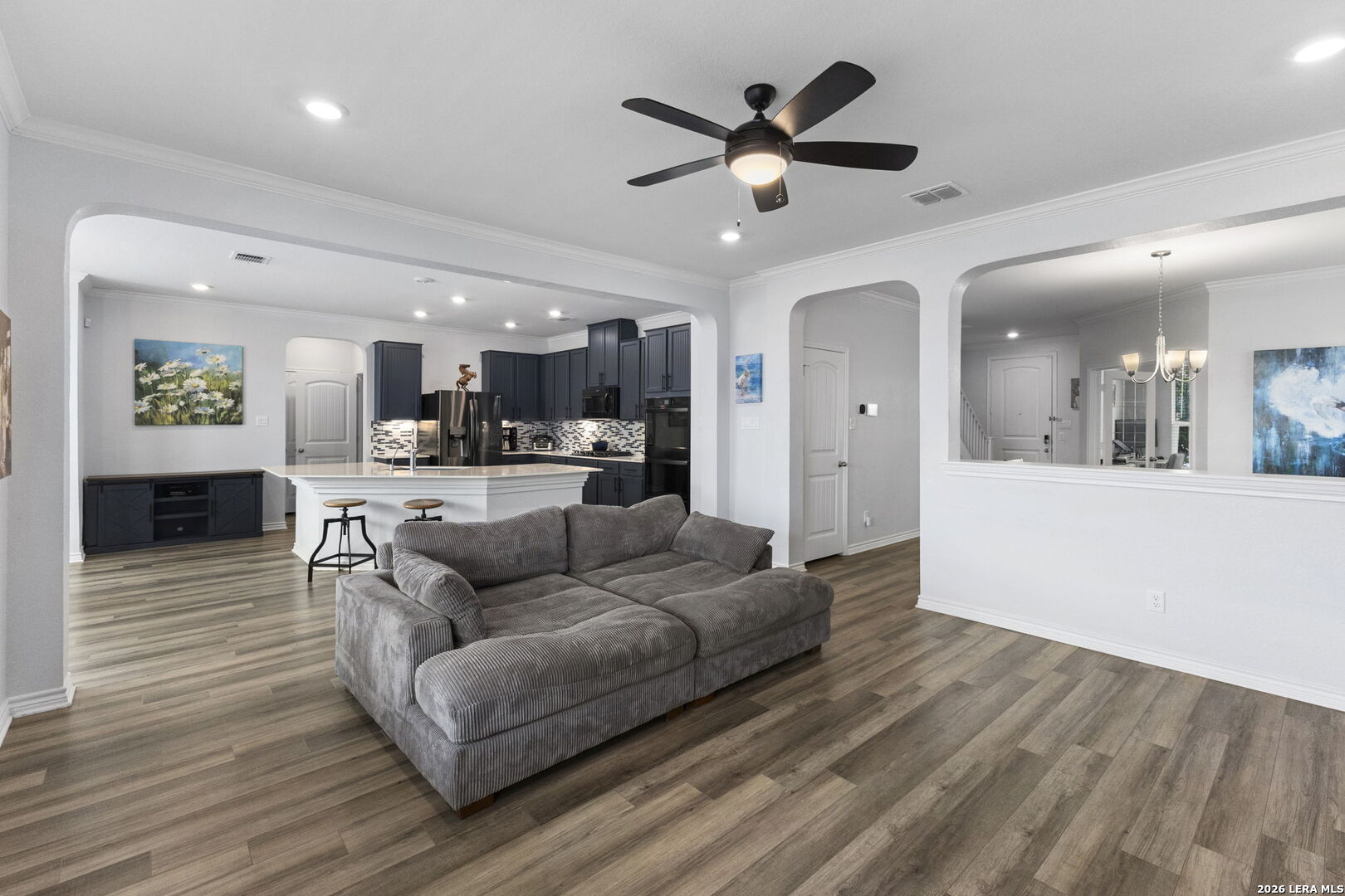 29985 Sebastian Bulverde, TX 78163 - Photo 8 of 37 a living room with furniture and a view of kitchen