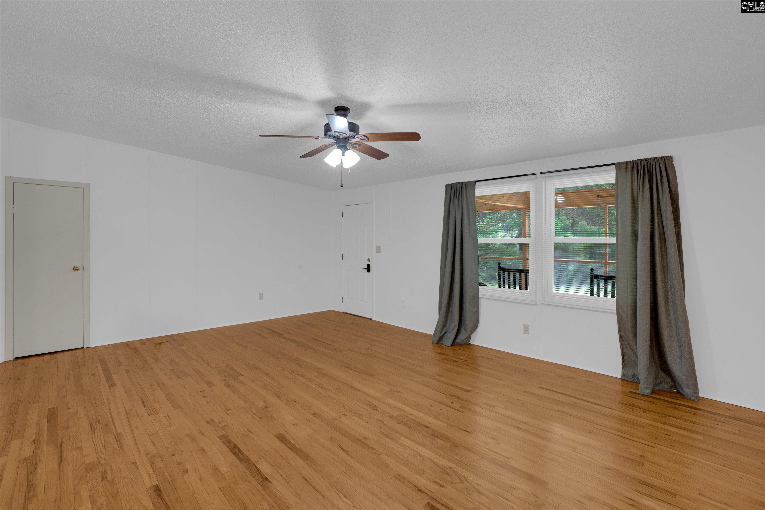 304 Cooper Road Blythewood, SC 29016 - Photo 10 of 29 a view of an empty room with a window