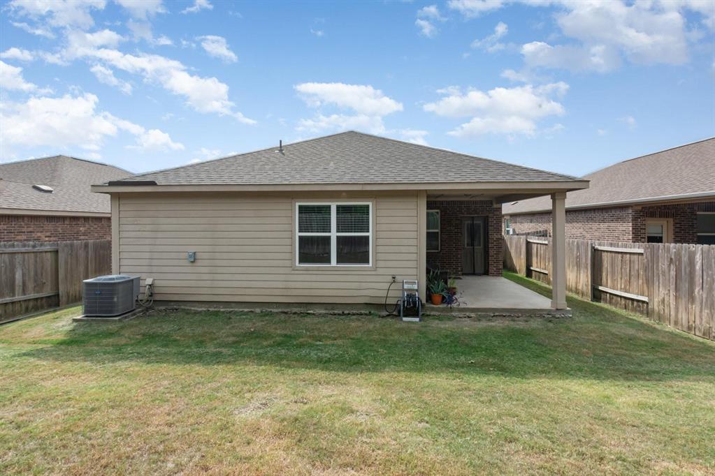 1906 Pilot Point Way Princeton, TX 75407 - Photo 14 of 14 a front view of a house with a yard