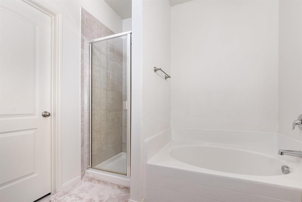 1906 Pilot Point Way Princeton, TX 75407 - Photo 9 of 14 a bathroom with a bathtub