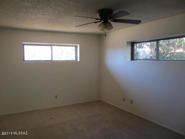 1160 Avenida Leon Rio Rico, AZ 85648 - Photo 22 of 47 an empty room with a window