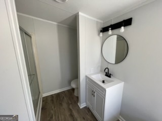 306 Dennard Road Unadilla, GA 31091 - Photo 14 of 14 a bathroom with a sink and a mirror