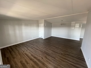 306 Dennard Road Unadilla, GA 31091 - Photo 5 of 14 a view of empty room with wooden floor