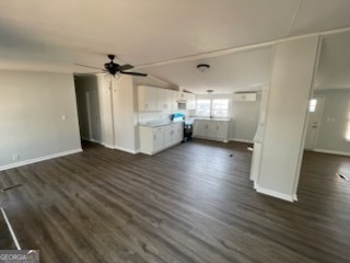 306 Dennard Road Unadilla, GA 31091 - Photo 7 of 14 a view of a livingroom with wooden floor