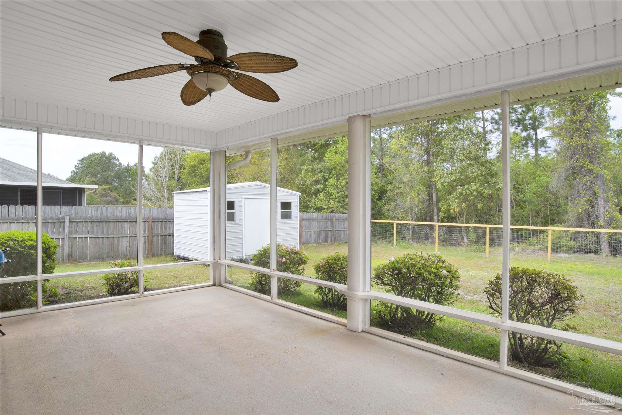 128 Gunwale Road Pensacola, FL 32507 - Photo 27 of 34 a view of a deck hardwood flooring and ceiling fan