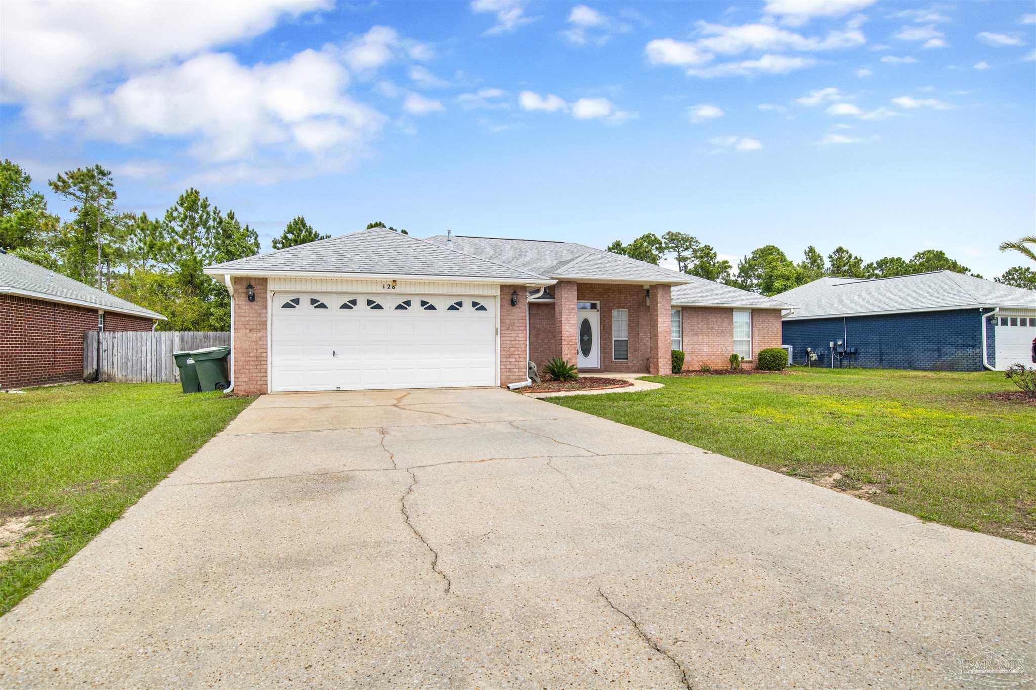 128 Gunwale Road Pensacola, FL 32507 - Photo 34 of 34 a view of a house with a yard