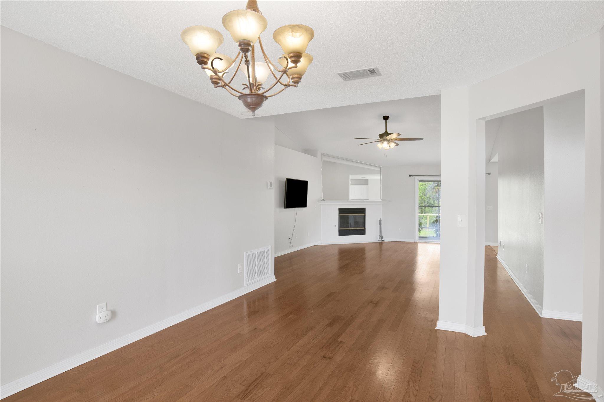 128 Gunwale Road Pensacola, FL 32507 - Photo 6 of 34 a view of a livingroom with wooden floor