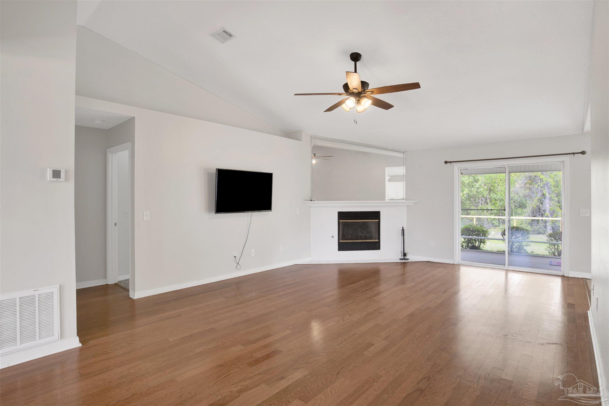 128 Gunwale Road Pensacola, FL 32507 - Photo 7 of 34 a view of a livingroom with a flat screen tv