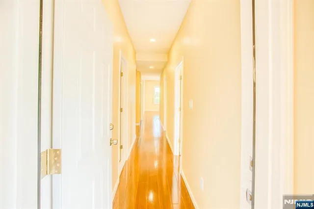 a view of a bathroom with a shower curtain
