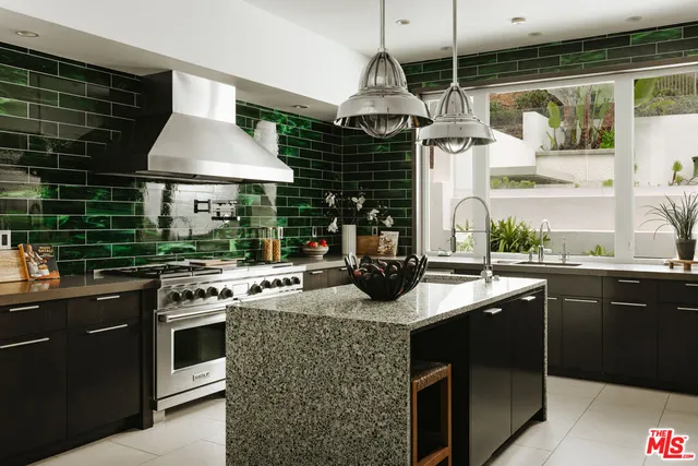 a kitchen with a stove and a sink