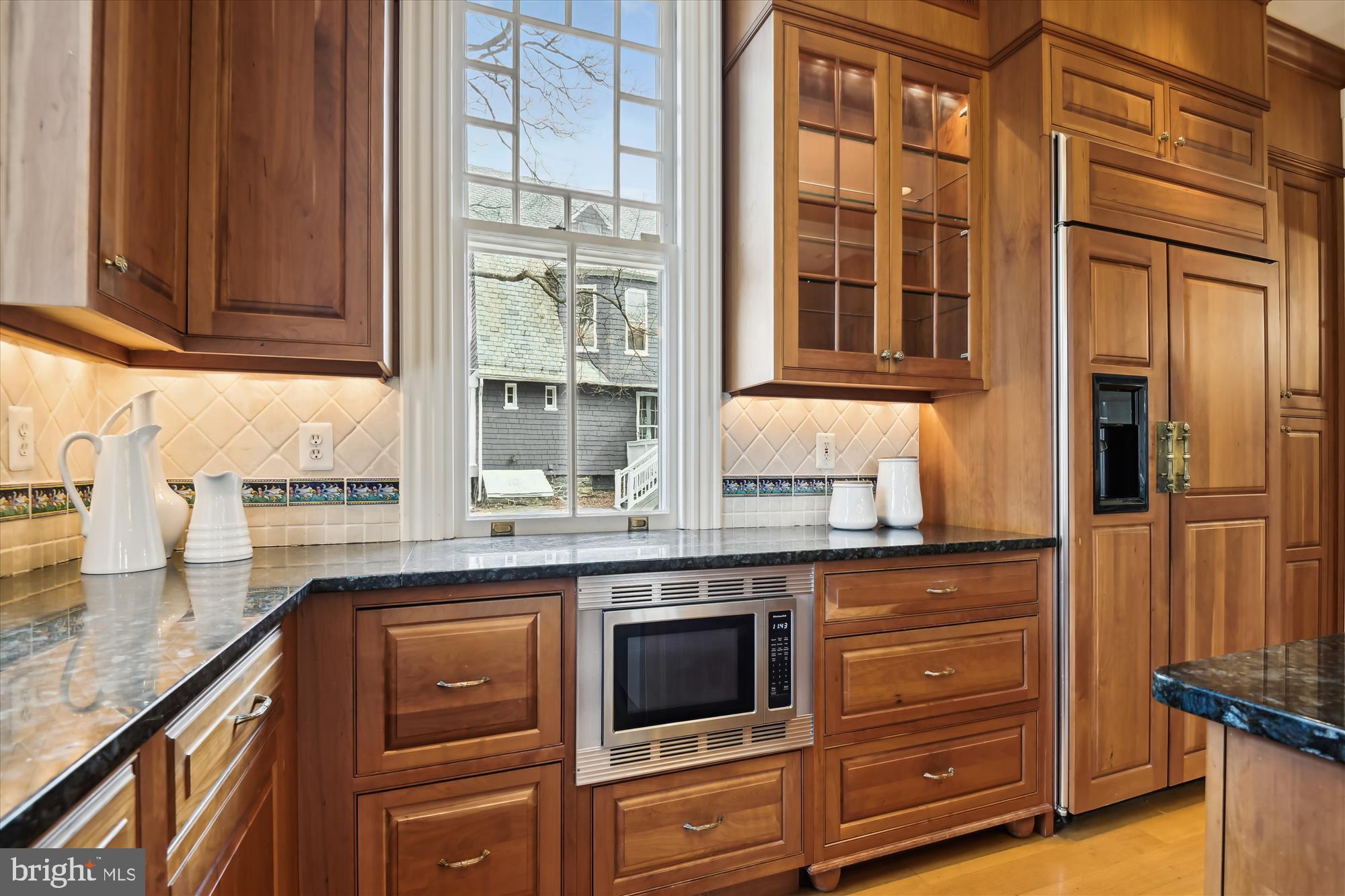 303 Oakdale Road Baltimore, MD 21210 - Photo 45 of 112 Kitchen w/ Granite Ctops and Tile Backsplash