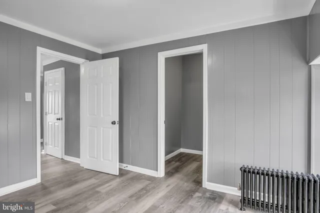 a view of entryway with wooden floor