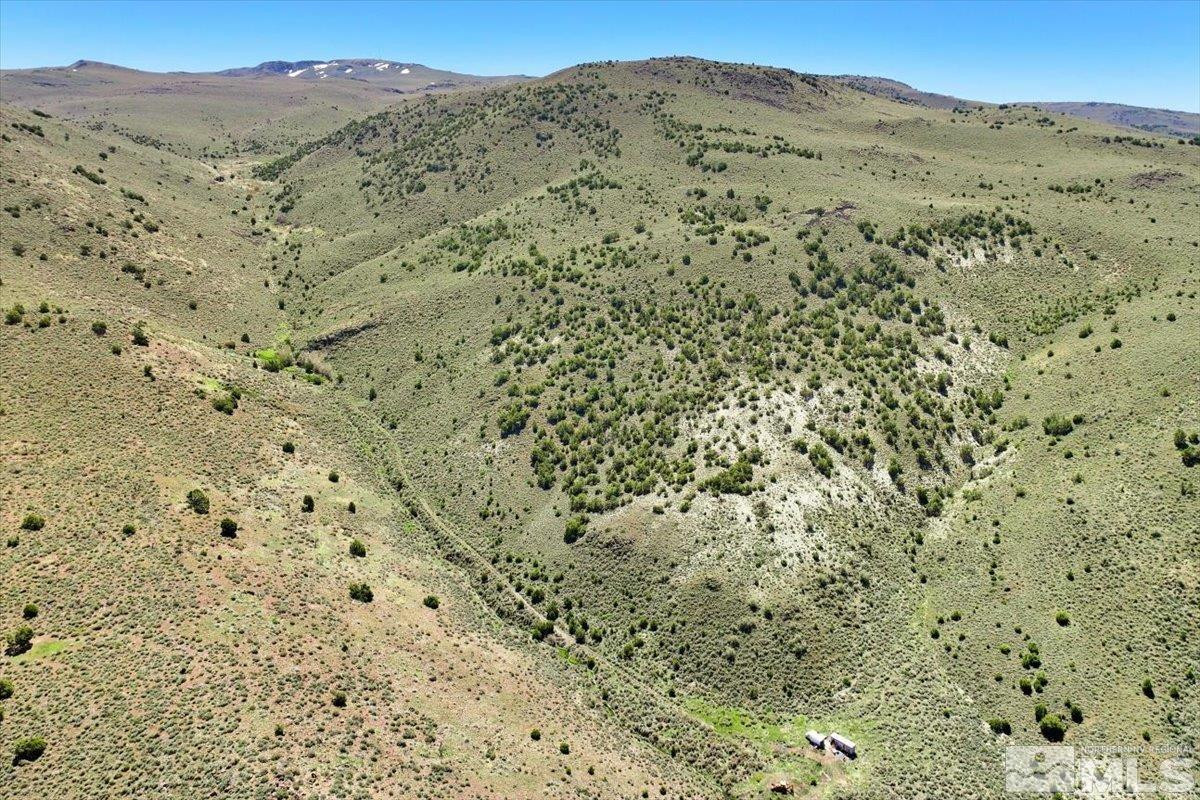 0 Pah Rah Springs Road Reno, NV 89510 - Photo 9 of 28 a view of a dry yard with mountains in the background