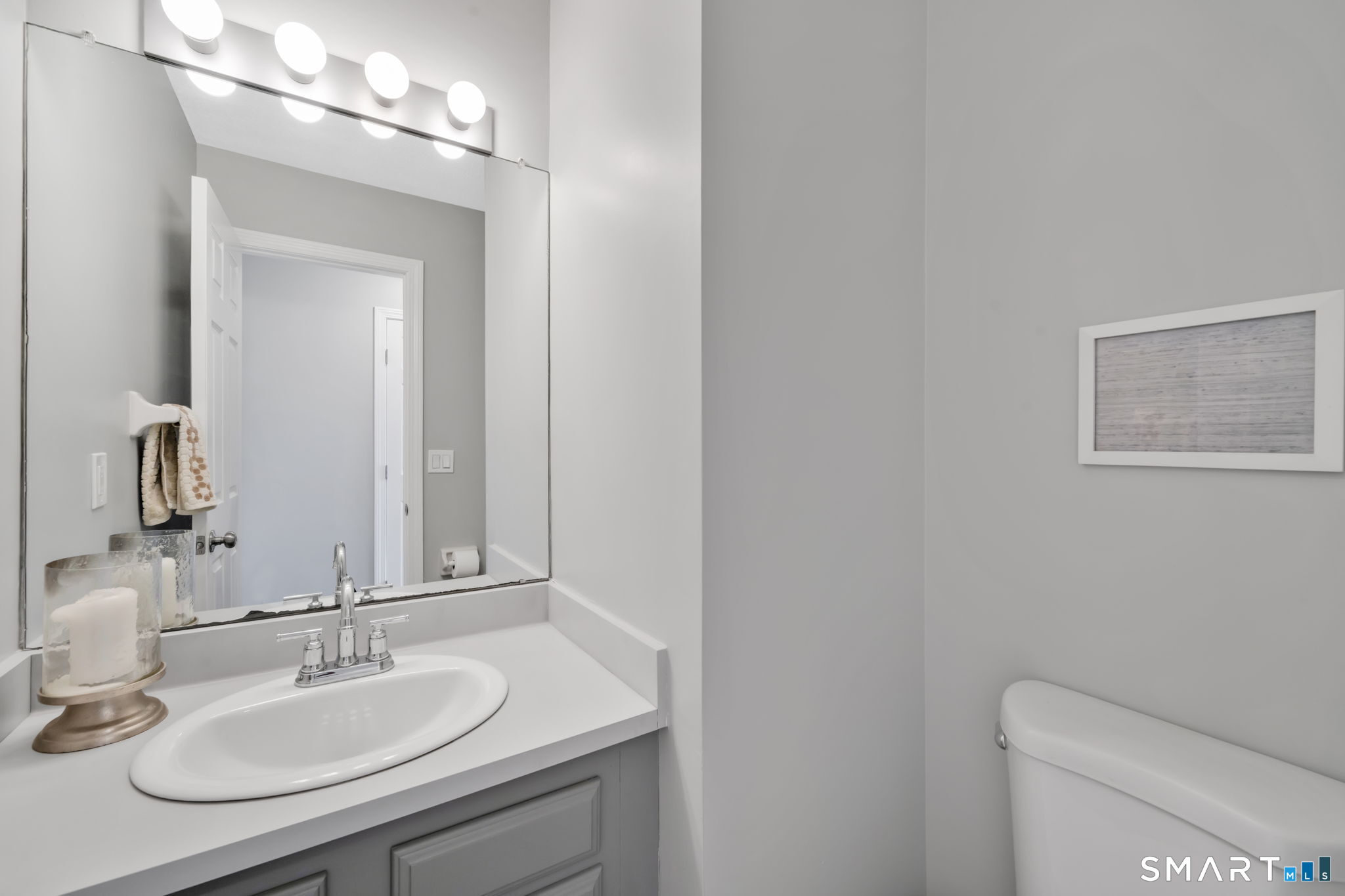 10 Depot Road, Unit 22 Willington, CT 06279 - Photo 13 of 36 a bathroom with a sink and a mirror