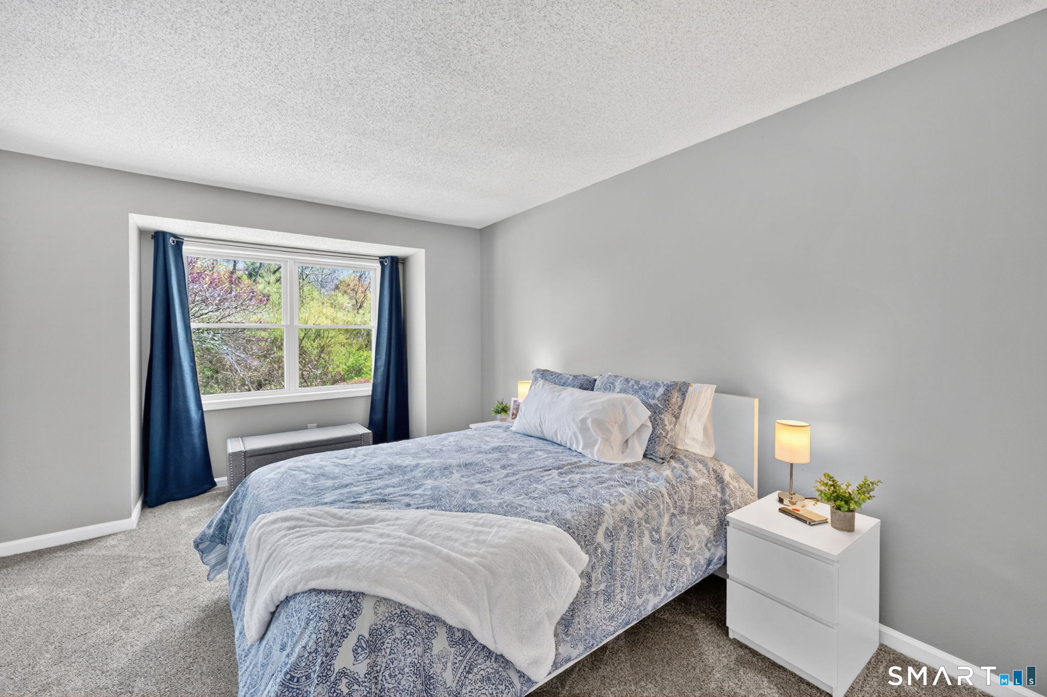 10 Depot Road, Unit 22 Willington, CT 06279 - Photo 17 of 36 a bedroom with a large bed and a window